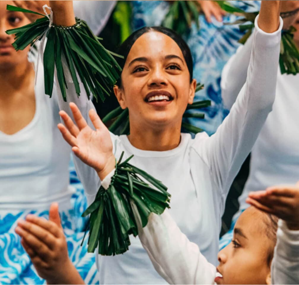 Community member with leafy greens